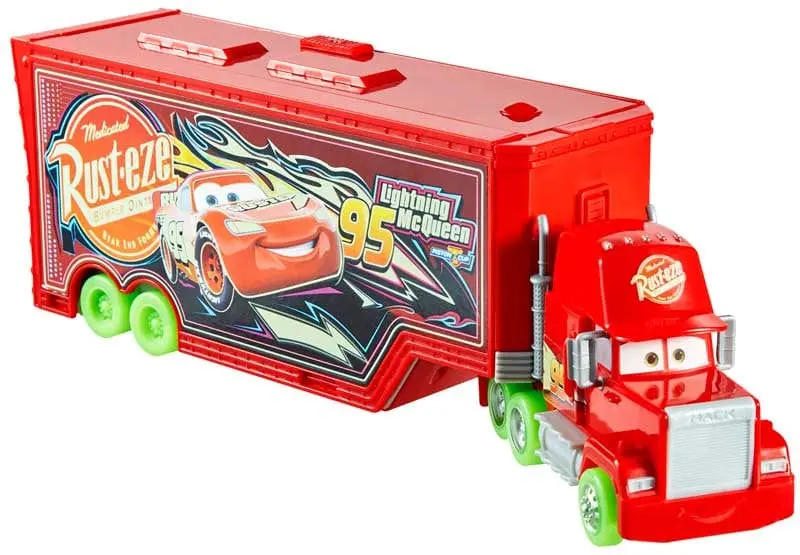 Disney Cars Mack Trasportatore Trasformabile, playset fluorescente con lanciatore 2 in 1