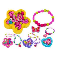 PERLINE IN LEGNO FIORE/CUORE 2COLORI